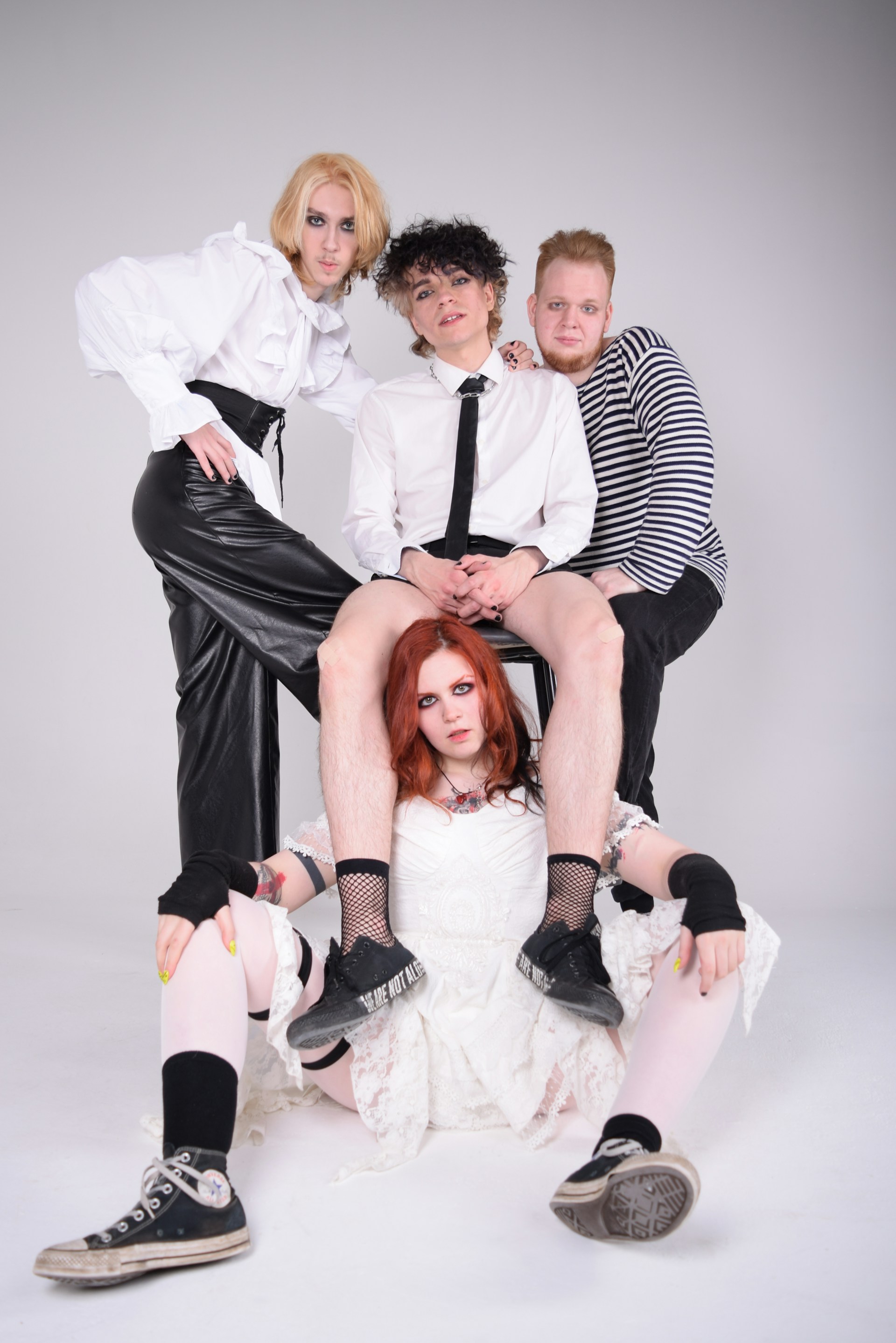 woman wearing yellow long-sleeved dress under white clouds and blue sky during daytime