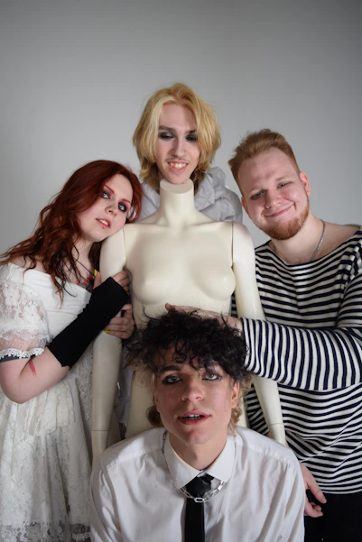 a group of people standing next to each other