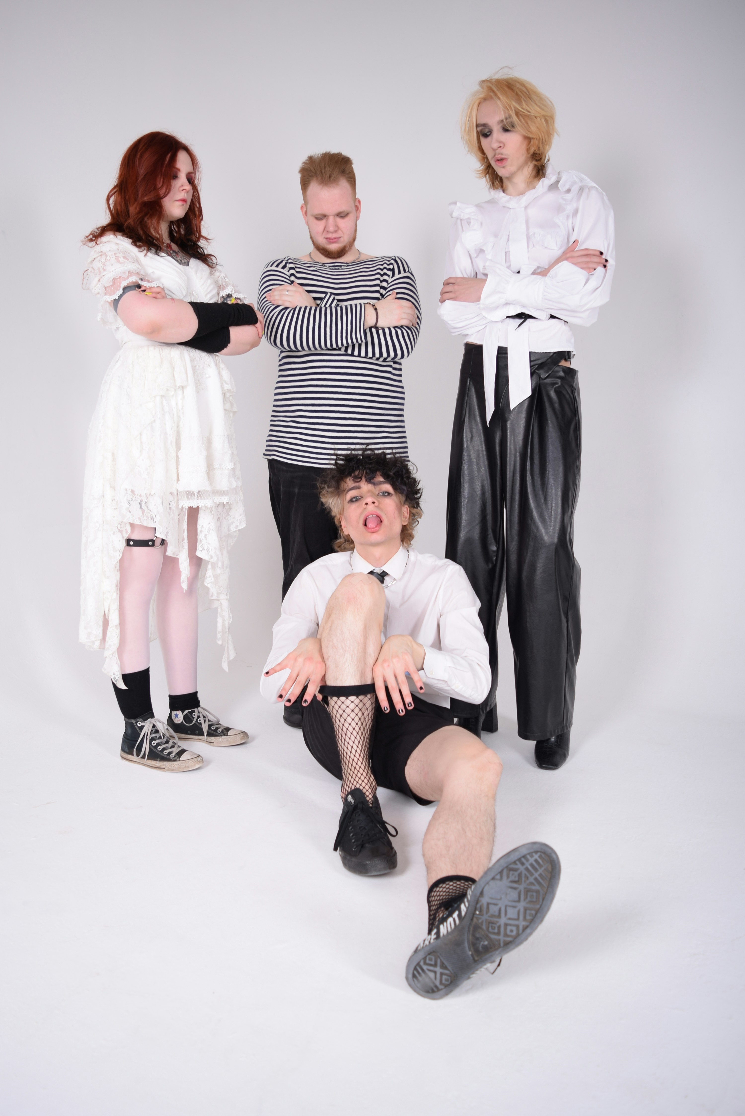 a group of people standing next to each other