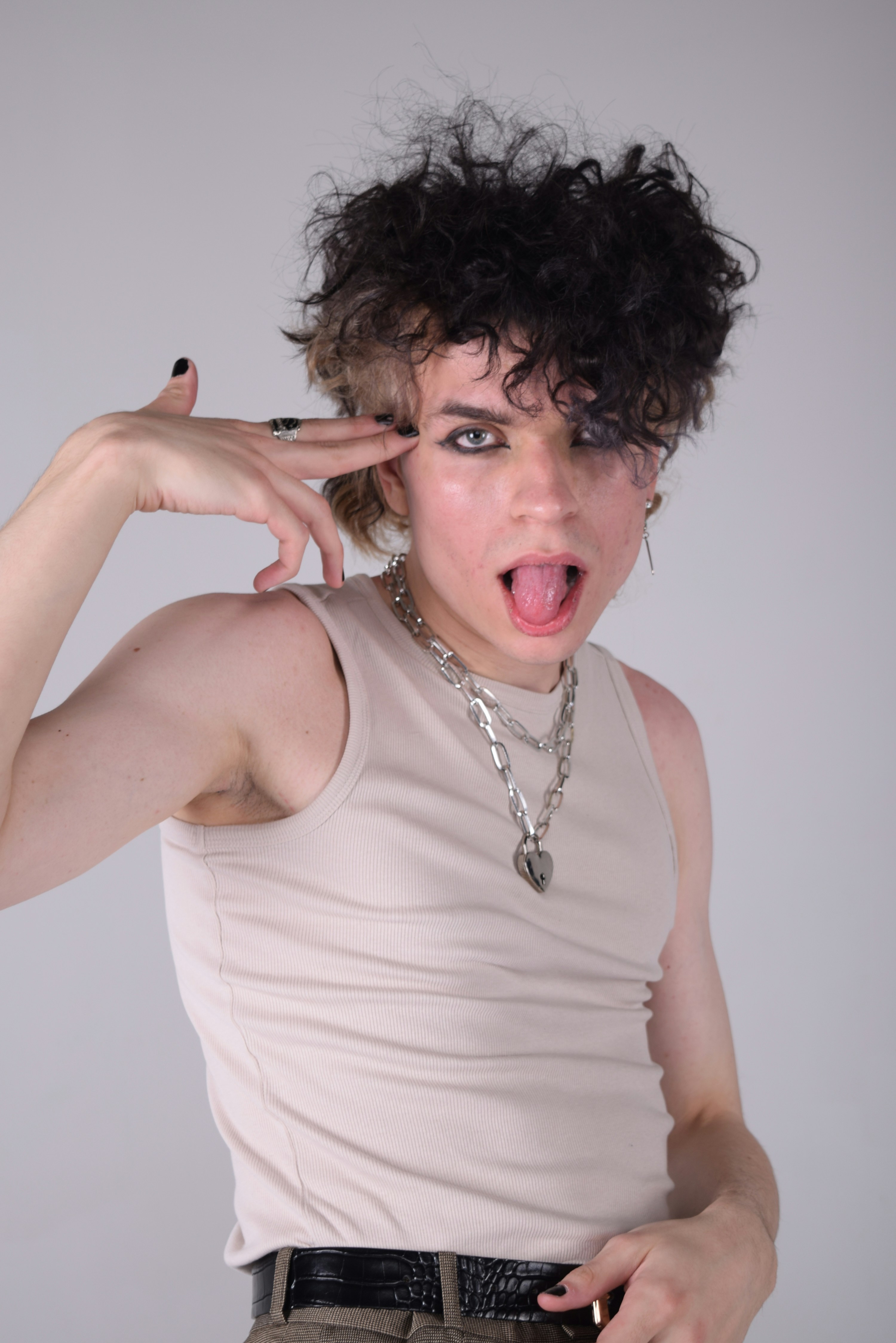 a woman making a funny face with her tongue out