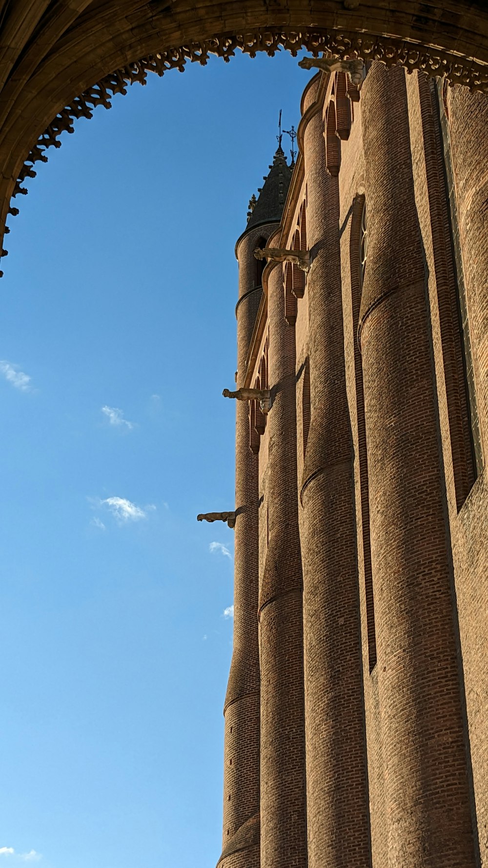 a tall building with a clock on the side of it