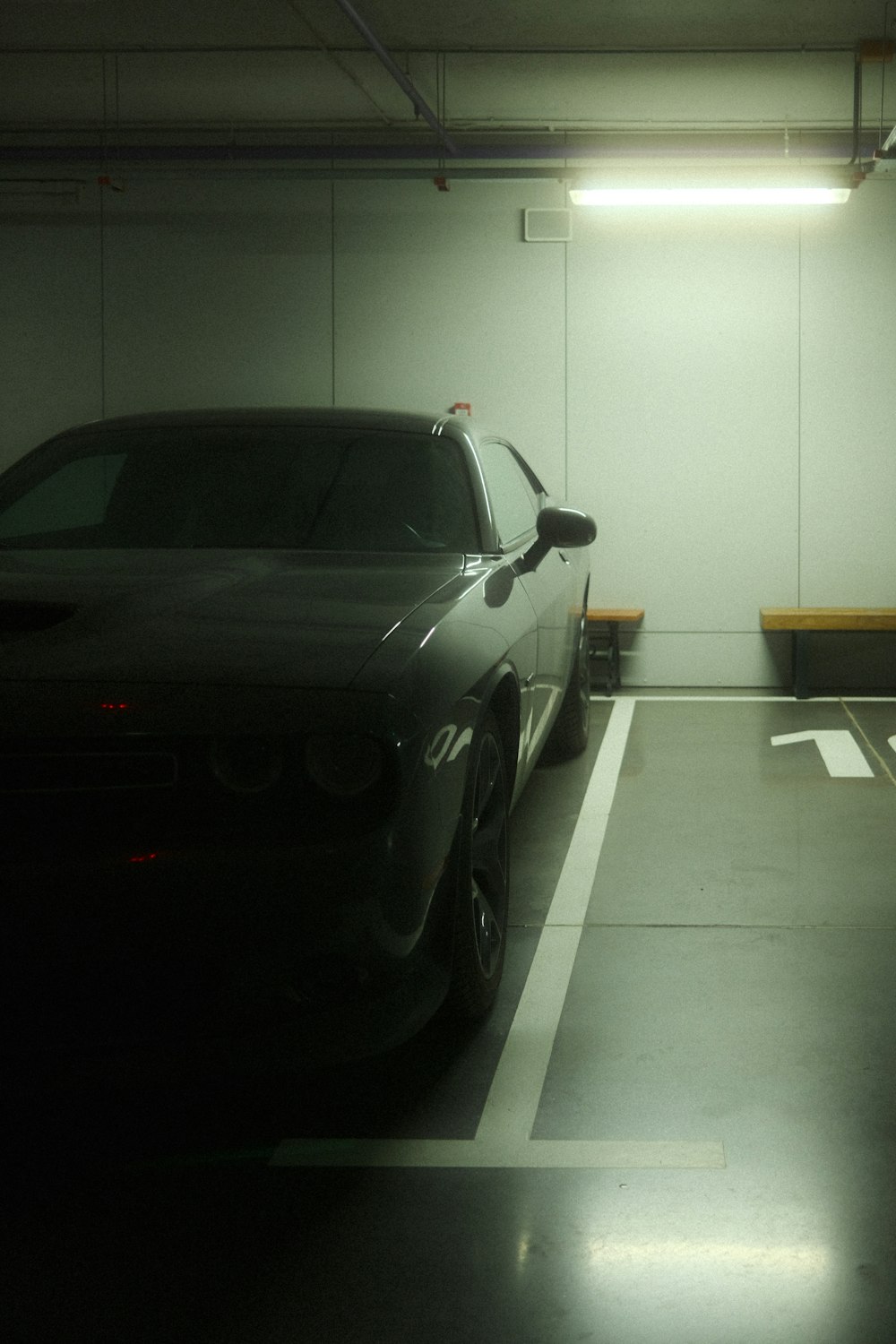 a car is parked in a parking garage