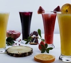 a table topped with different types of drinks