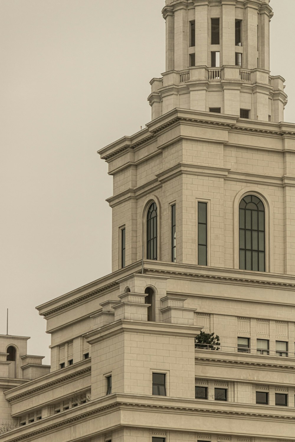 a very tall building with a clock on the top of it