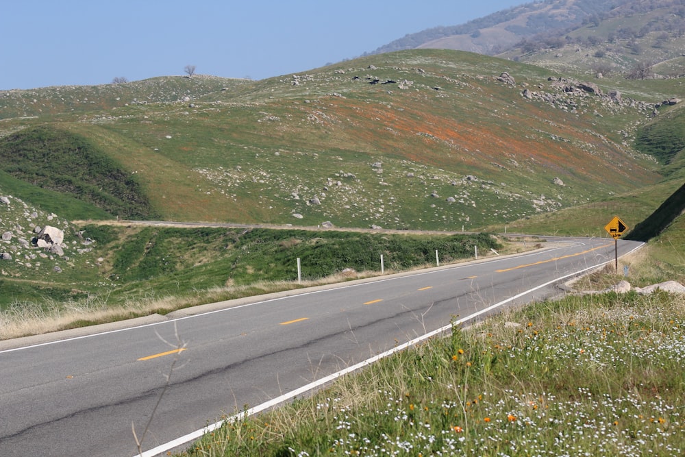 a road with a sign on the side of it