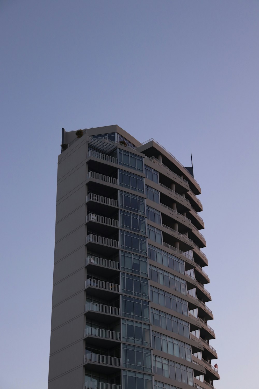 a tall building with lots of windows on top of it