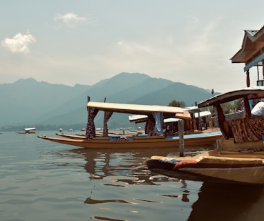 a couple of boats that are sitting in the water