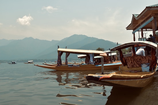 a couple of boats that are sitting in the water