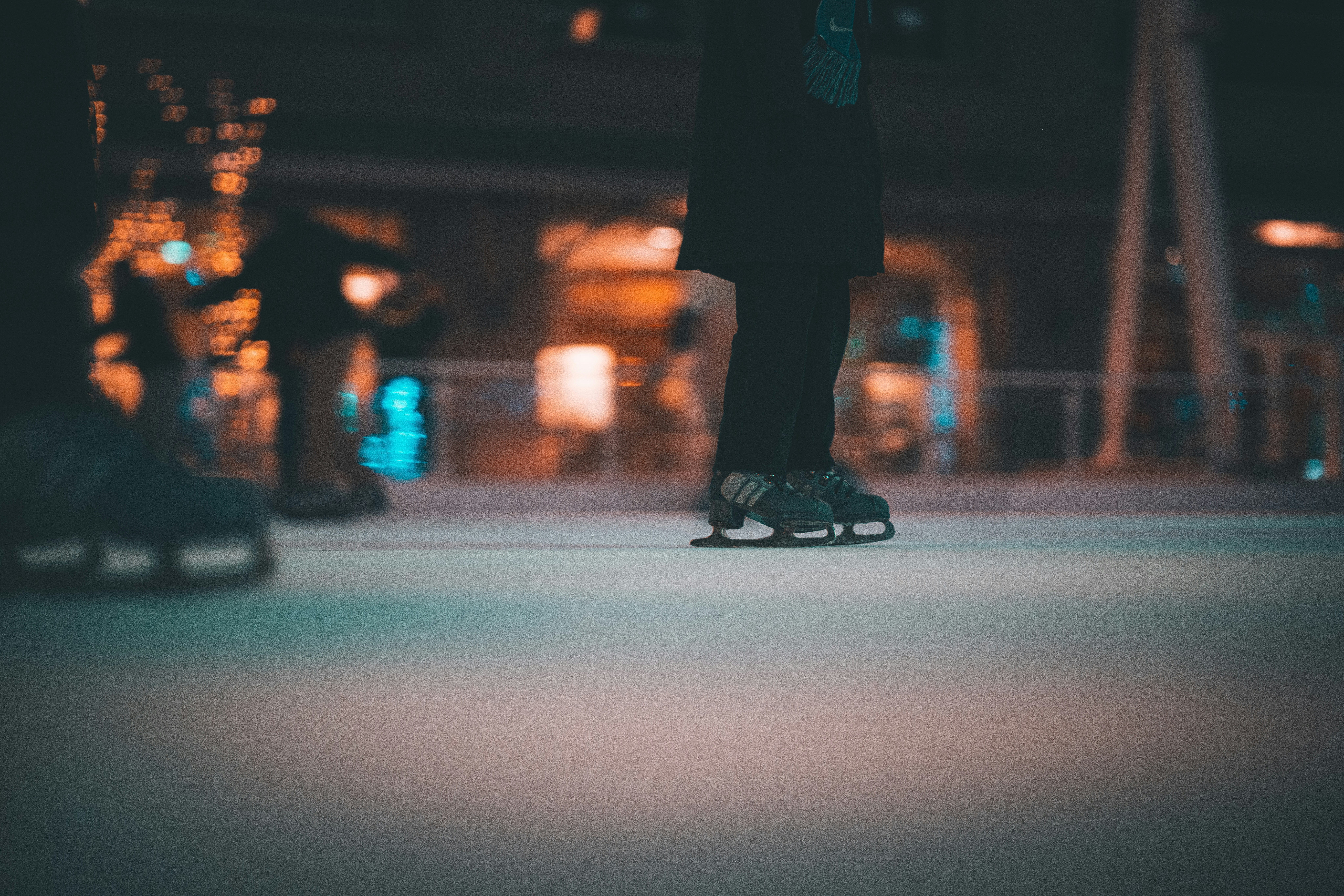 a person standing on top of a skateboard on a street