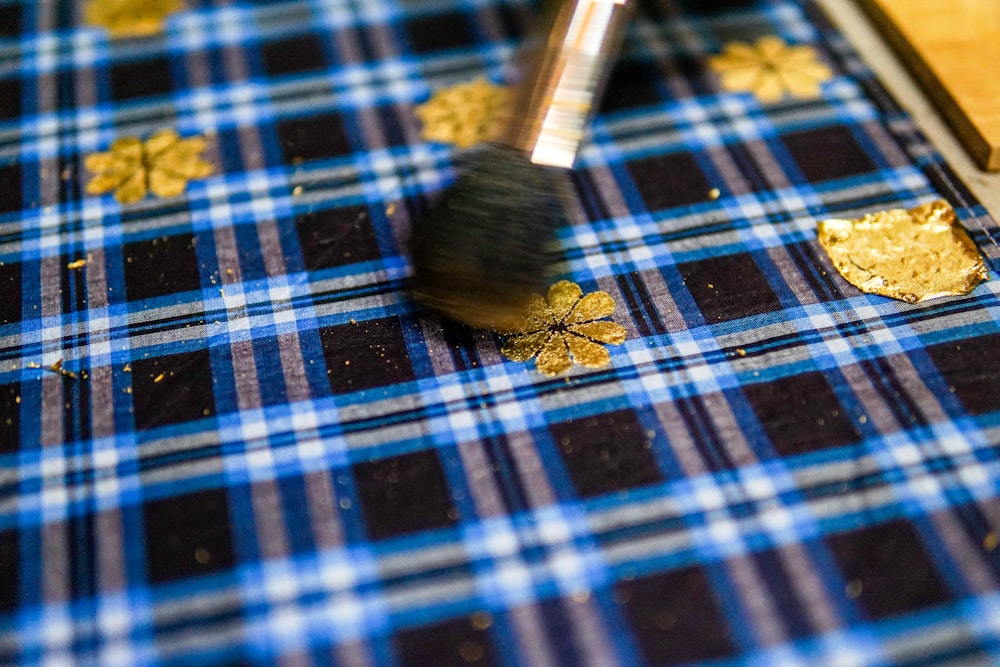 a close up of a brush on a table