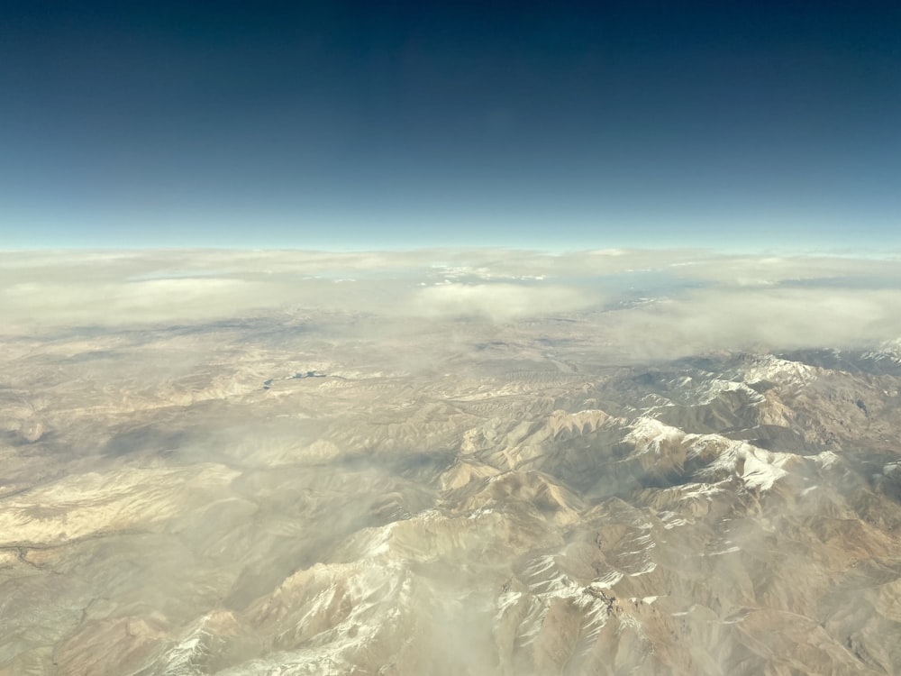 a view of a mountain range from an airplane