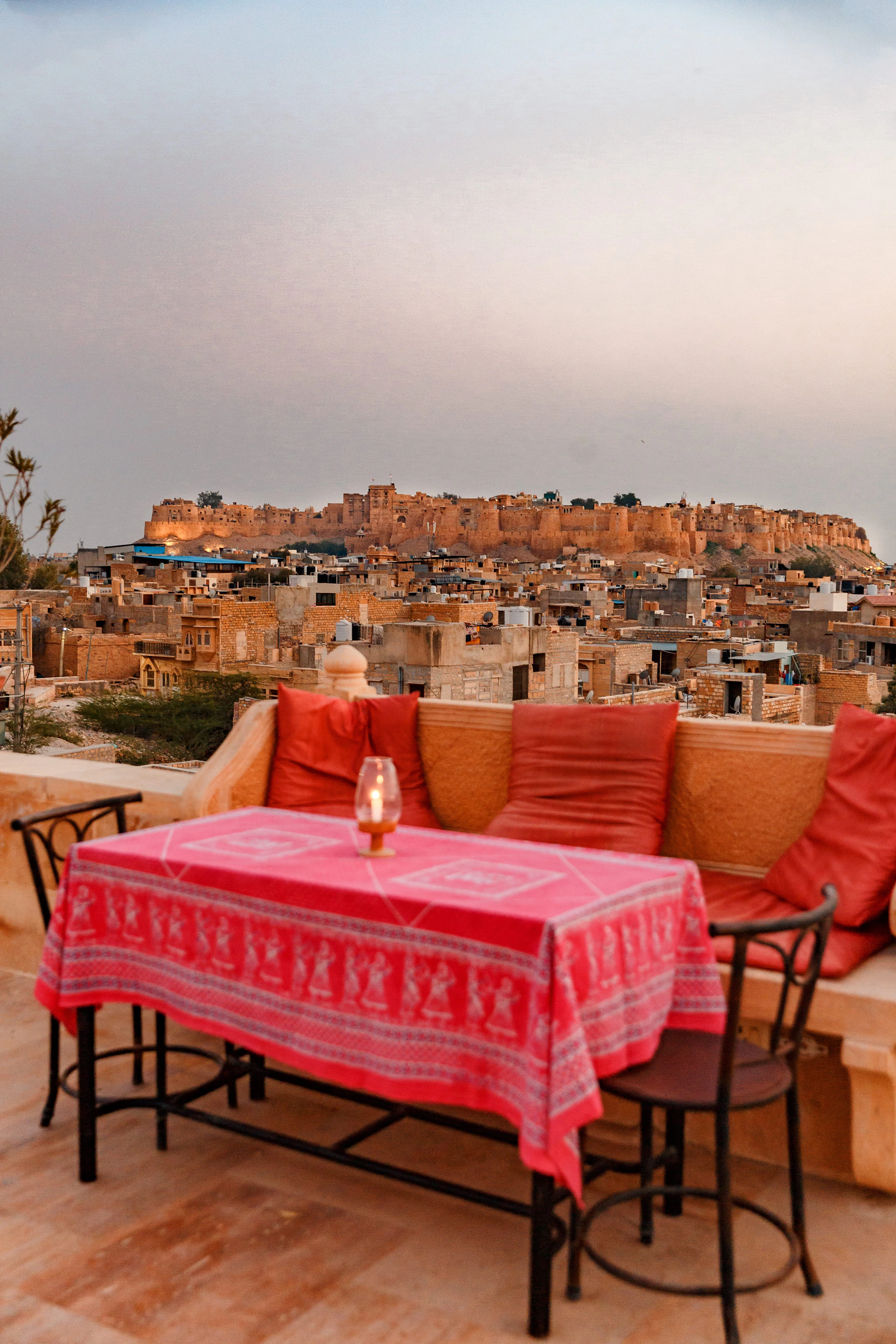 a table with a red tablecloth on top of it