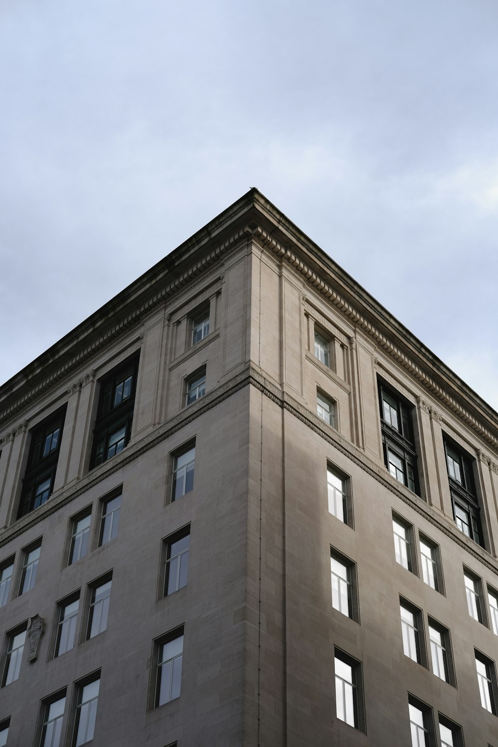 a tall building with lots of windows on top of it