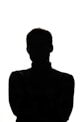 a silhouette of a man with his arms crossed