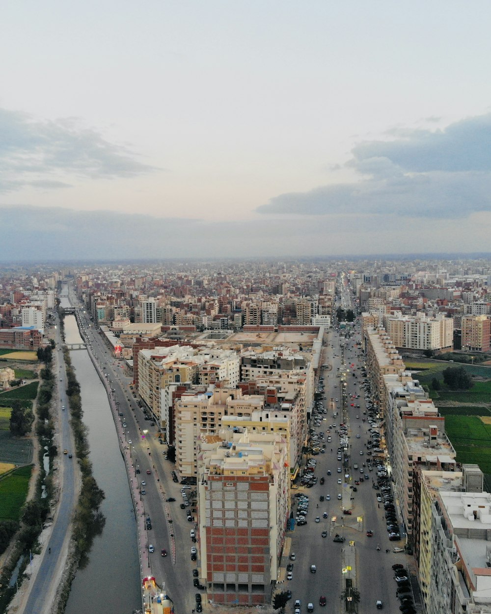 an aerial view of a city with a river running through it