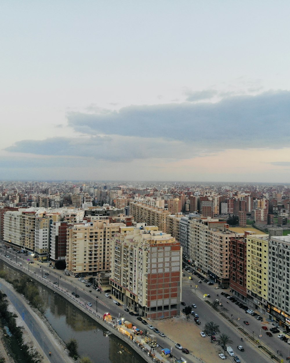 a view of a city with a river running through it