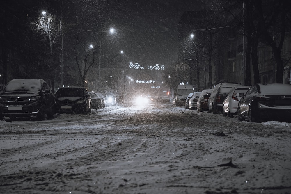 a street filled with lots of snow at night