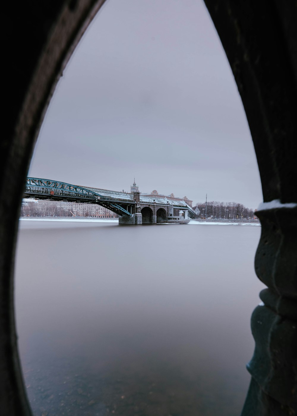 a view of a bridge over a body of water