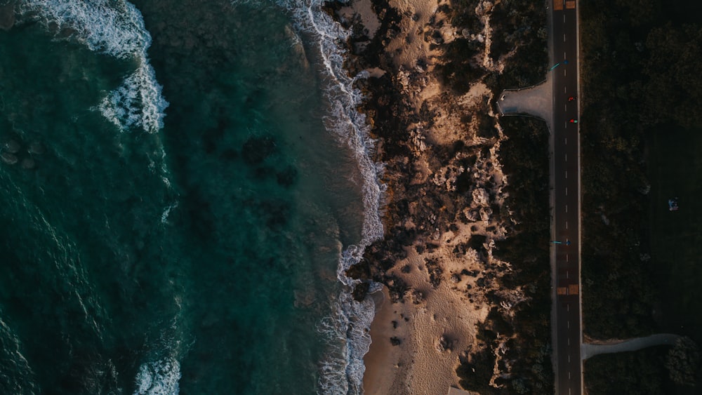 an aerial view of a beach and ocean