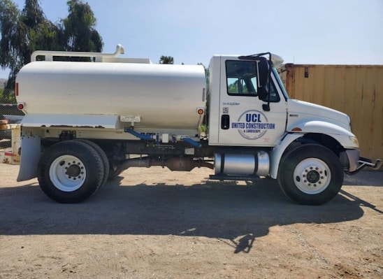 A fleet of tipper trucks ready for rental.