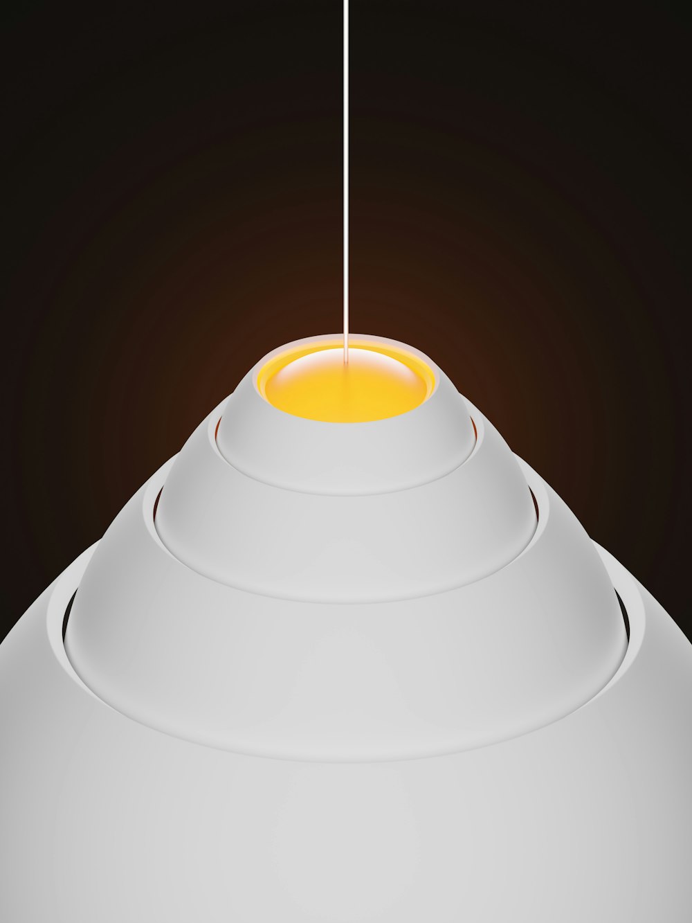 a white object with a yellow light on top of it