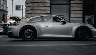 Renault Megane parked on a city street, silver color.