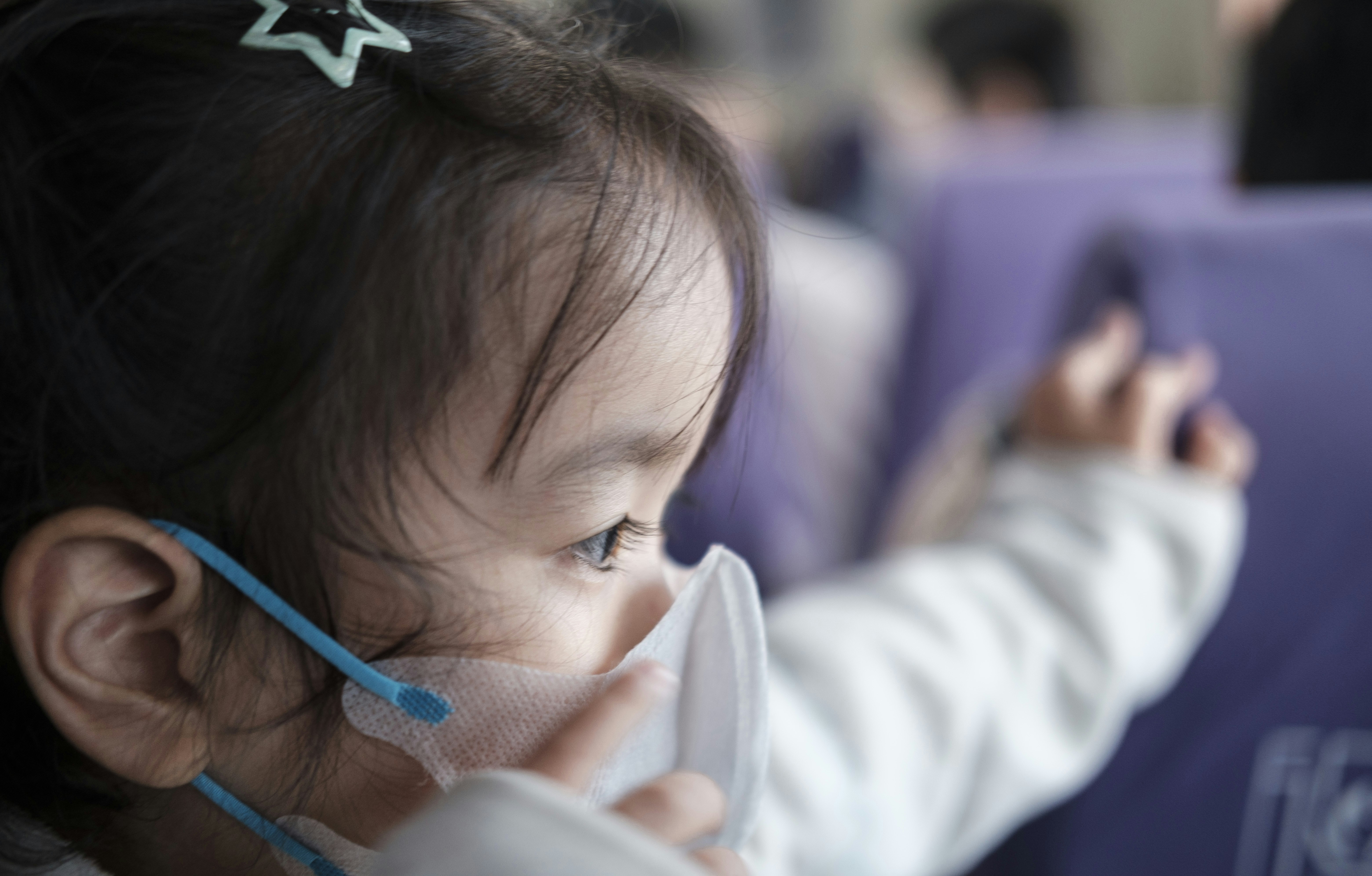 a little girl with a star on her head