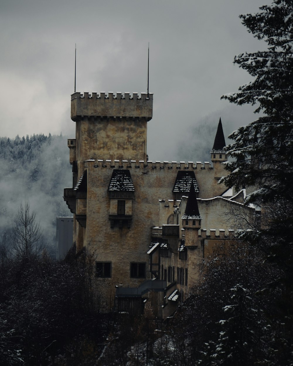 an old castle with a clock tower on top of it