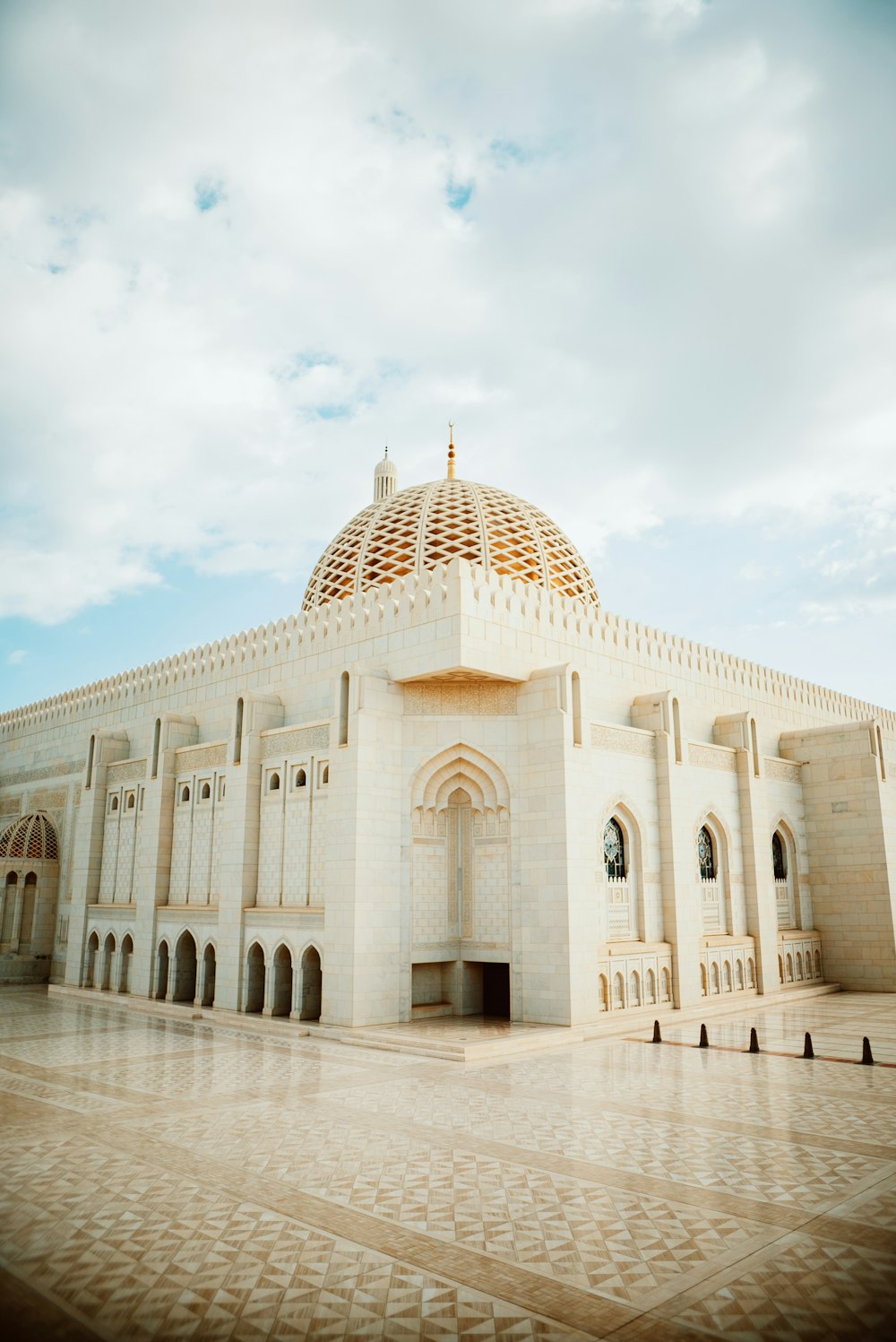 a large white building with a dome on top of it