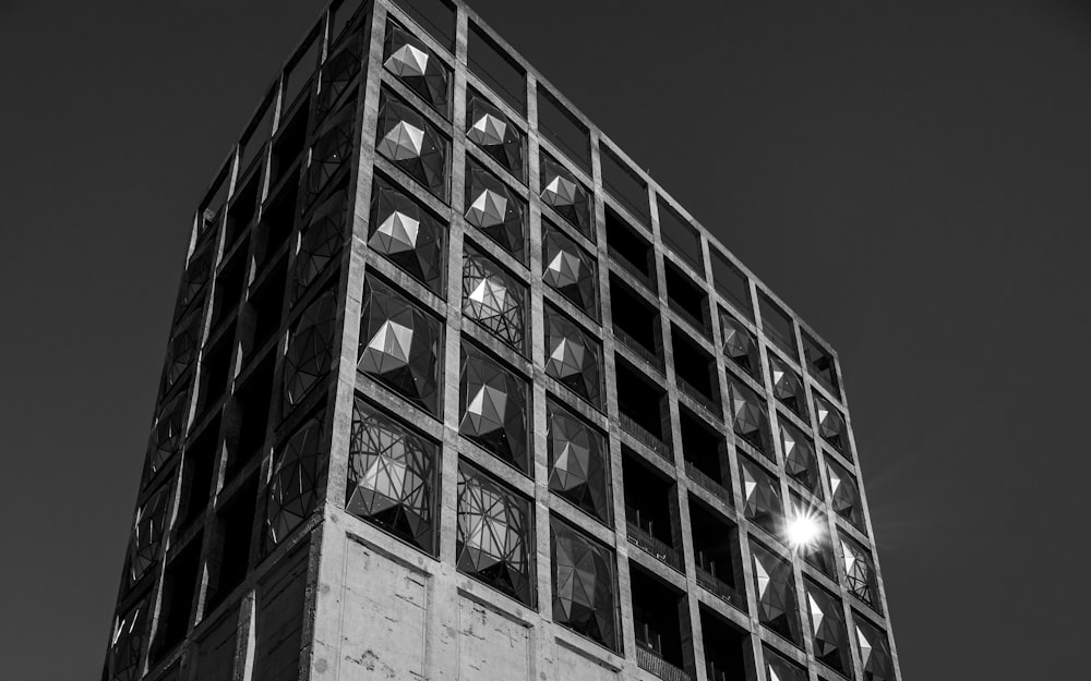 a black and white photo of a tall building