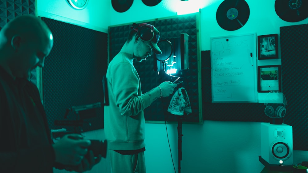 a man standing in front of a mirror in a room