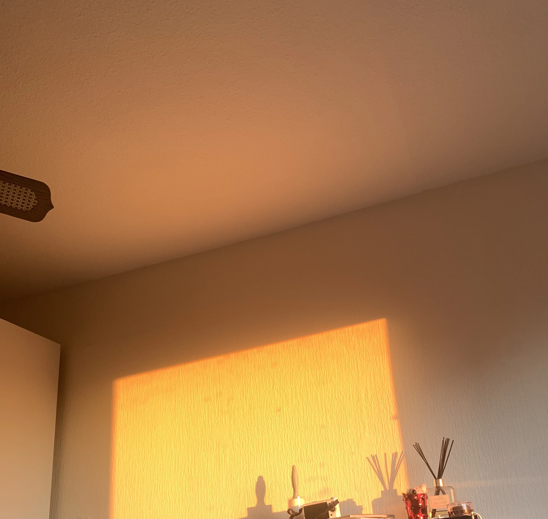 woman wearing yellow long-sleeved dress under white clouds and blue sky during daytime