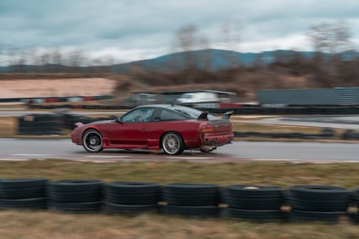 Exciting racing game screenshot showing a fast car on a winding track.