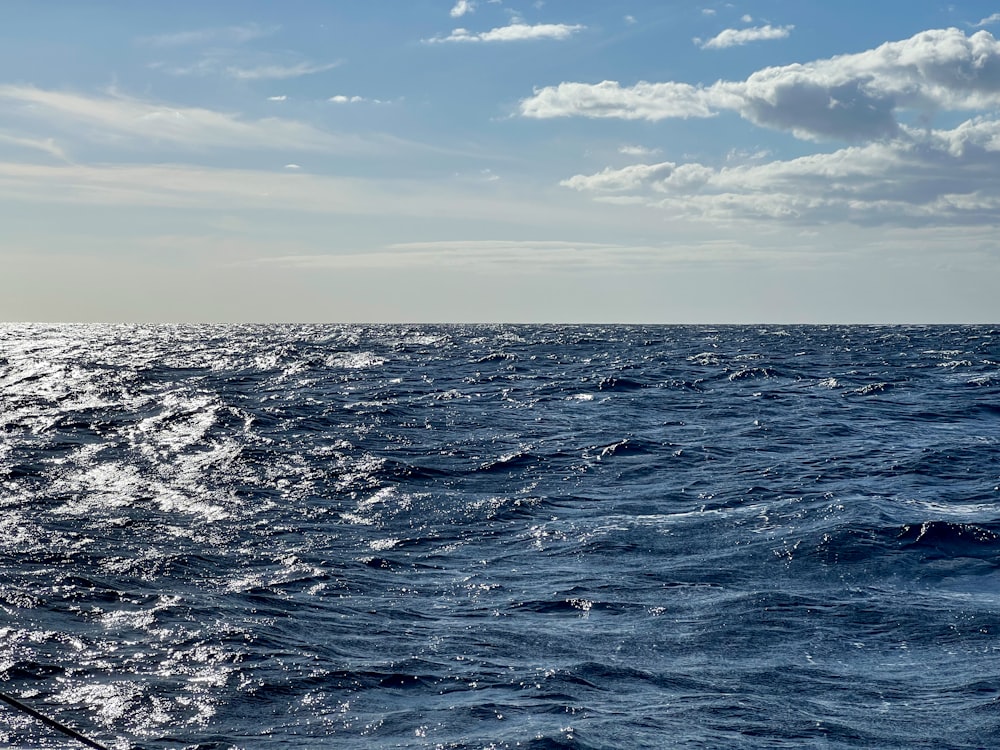 a sailboat in the middle of a large body of water