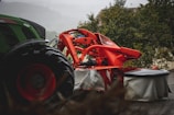 a tractor is parked next to a round table