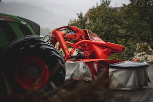 a tractor is parked next to a round table