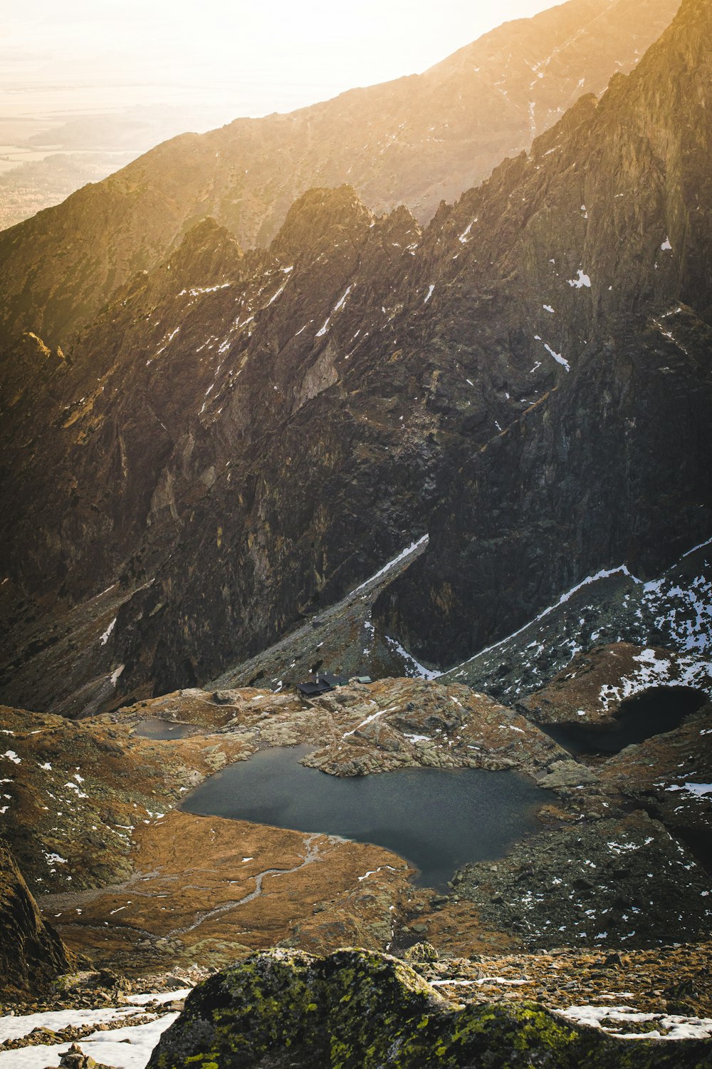 Sharp granite peaks of the High Tatras in Slovakia reflected in a glacial lake