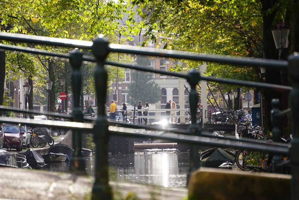 a view of a canal through a fence