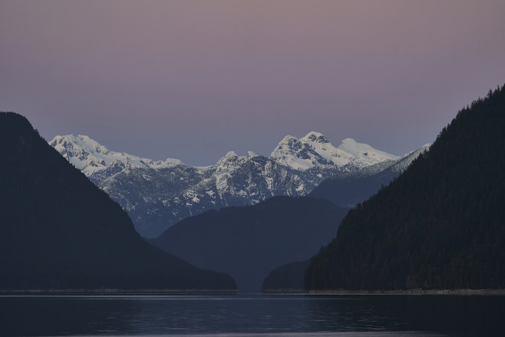 a view of a mountain range from a lake