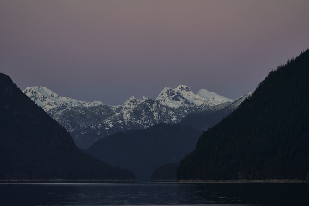 a view of a mountain range from a lake