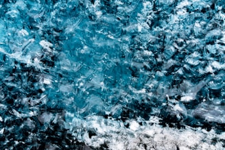Dark blue abstract ice pattern background with subtle frost texture.