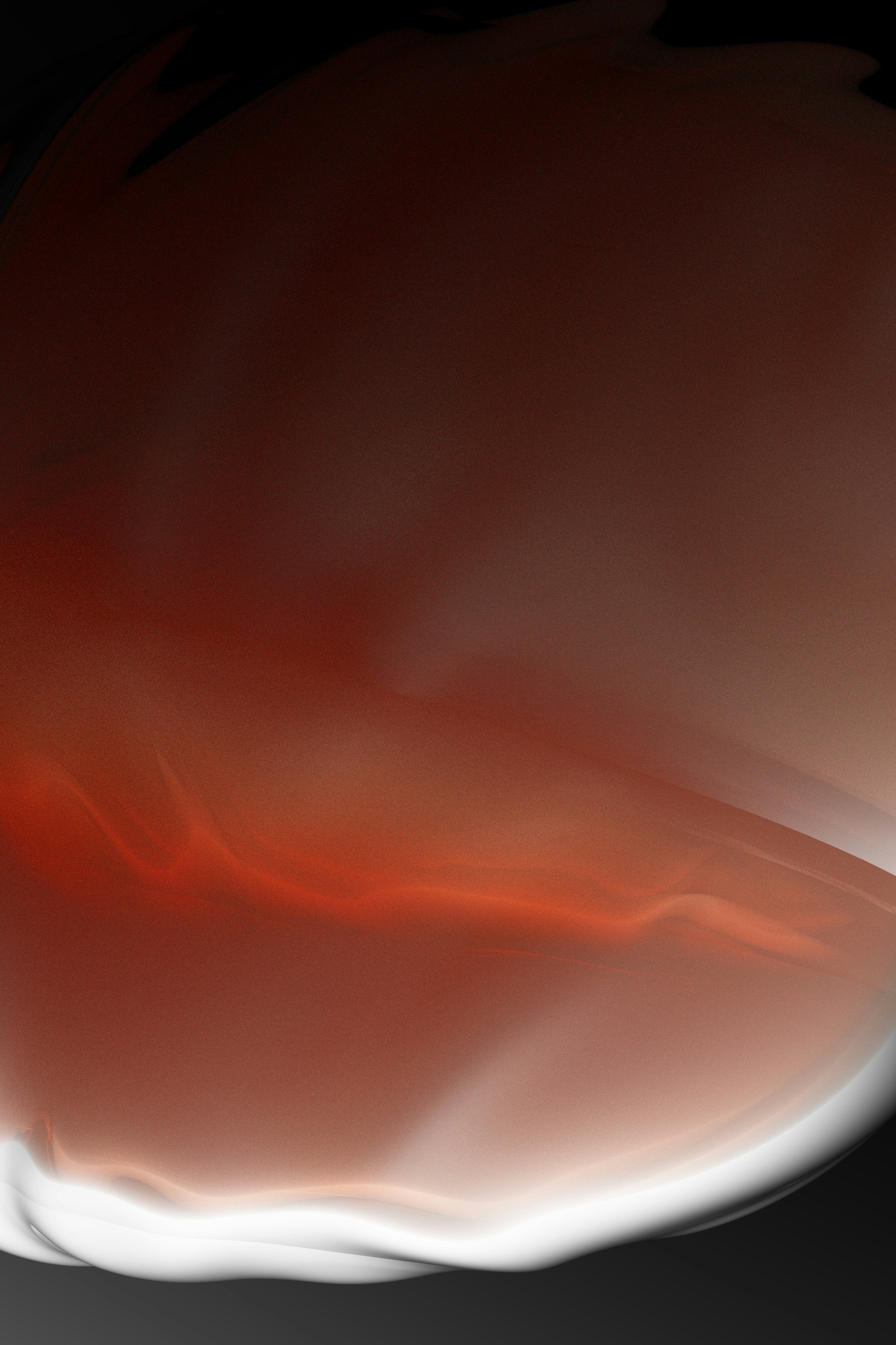 a close up of a red and white object with a black background