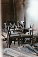 A collection of multwood chairs in various styles.