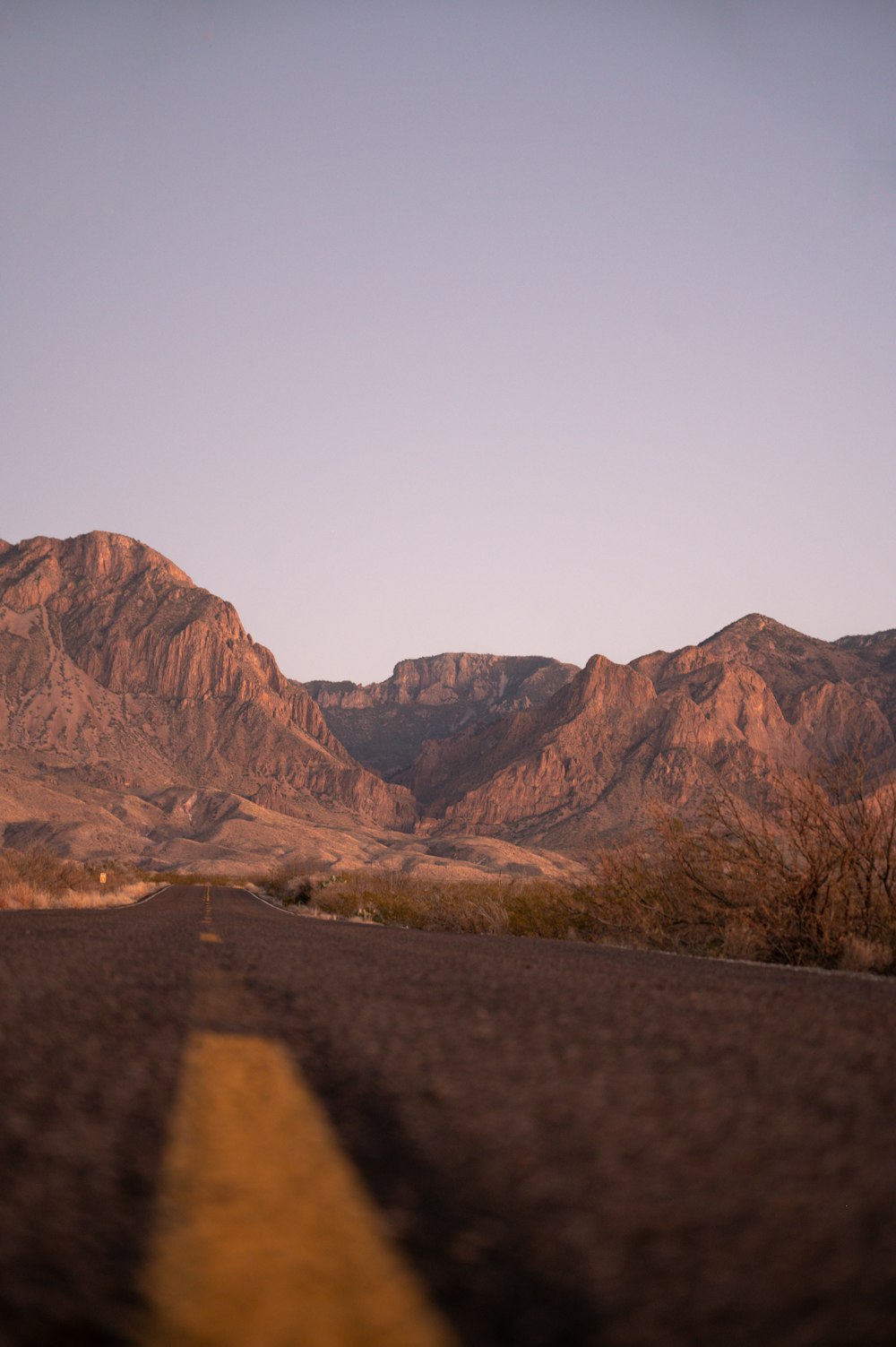 a view of a mountain range from a road