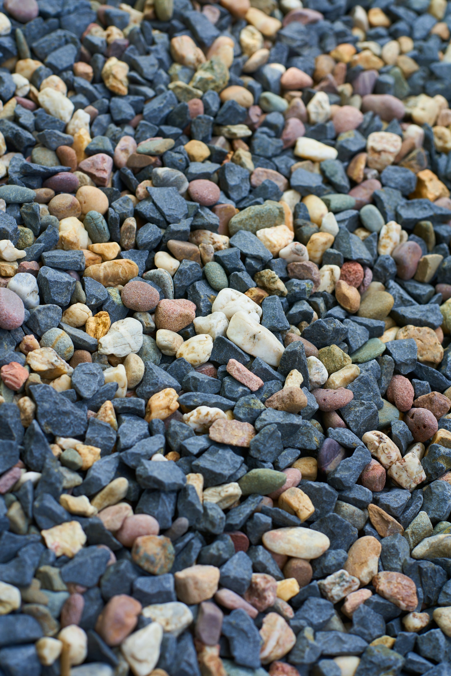 a close up of a bunch of rocks and gravel