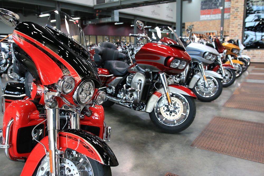 a row of motorcycles parked next to each other