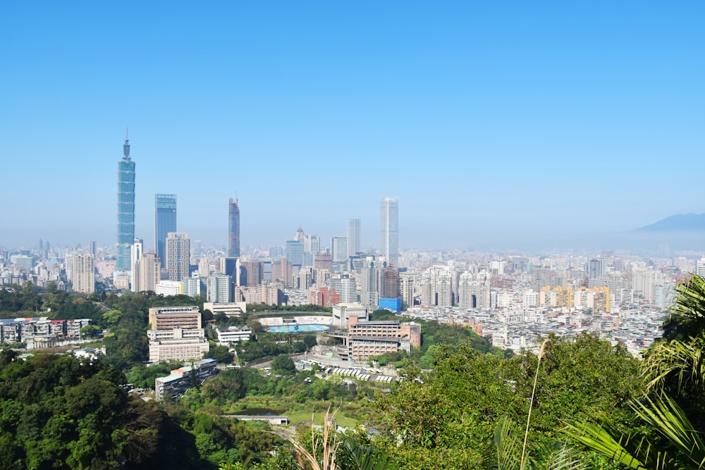 a view of a city with tall buildings