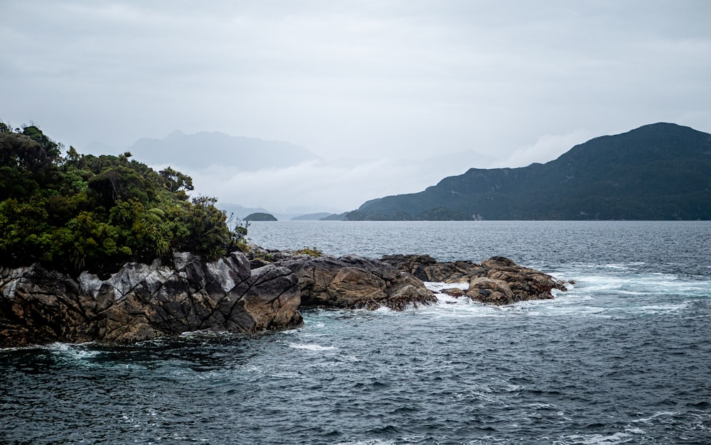 a large body of water surrounded by mountains