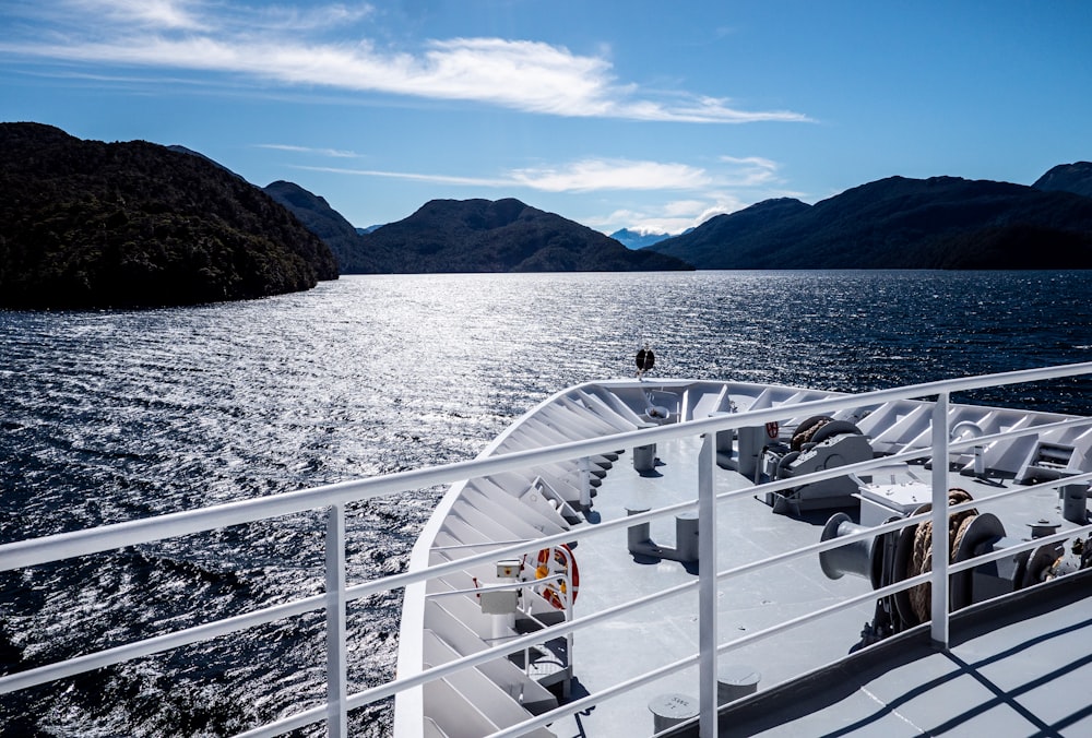 a boat traveling across a large body of water