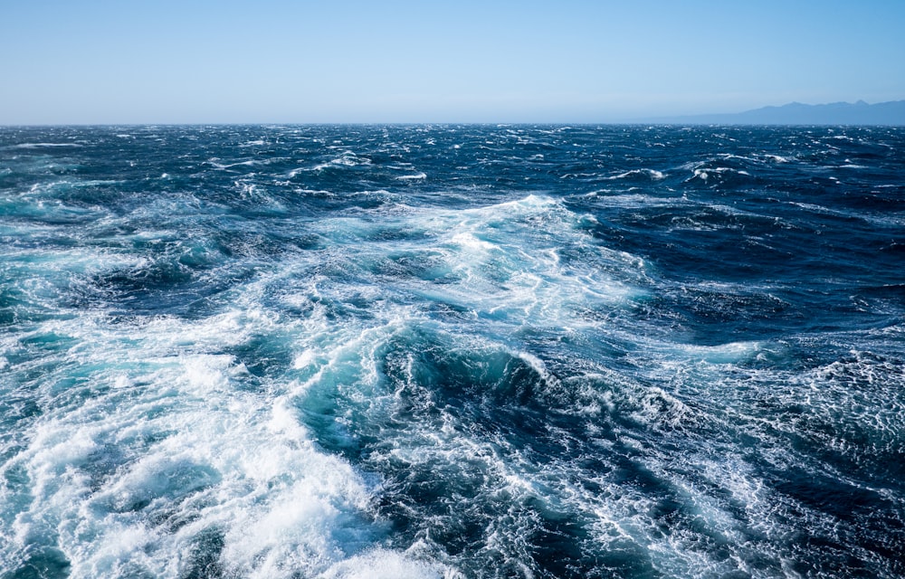 the wake of a boat in the open ocean